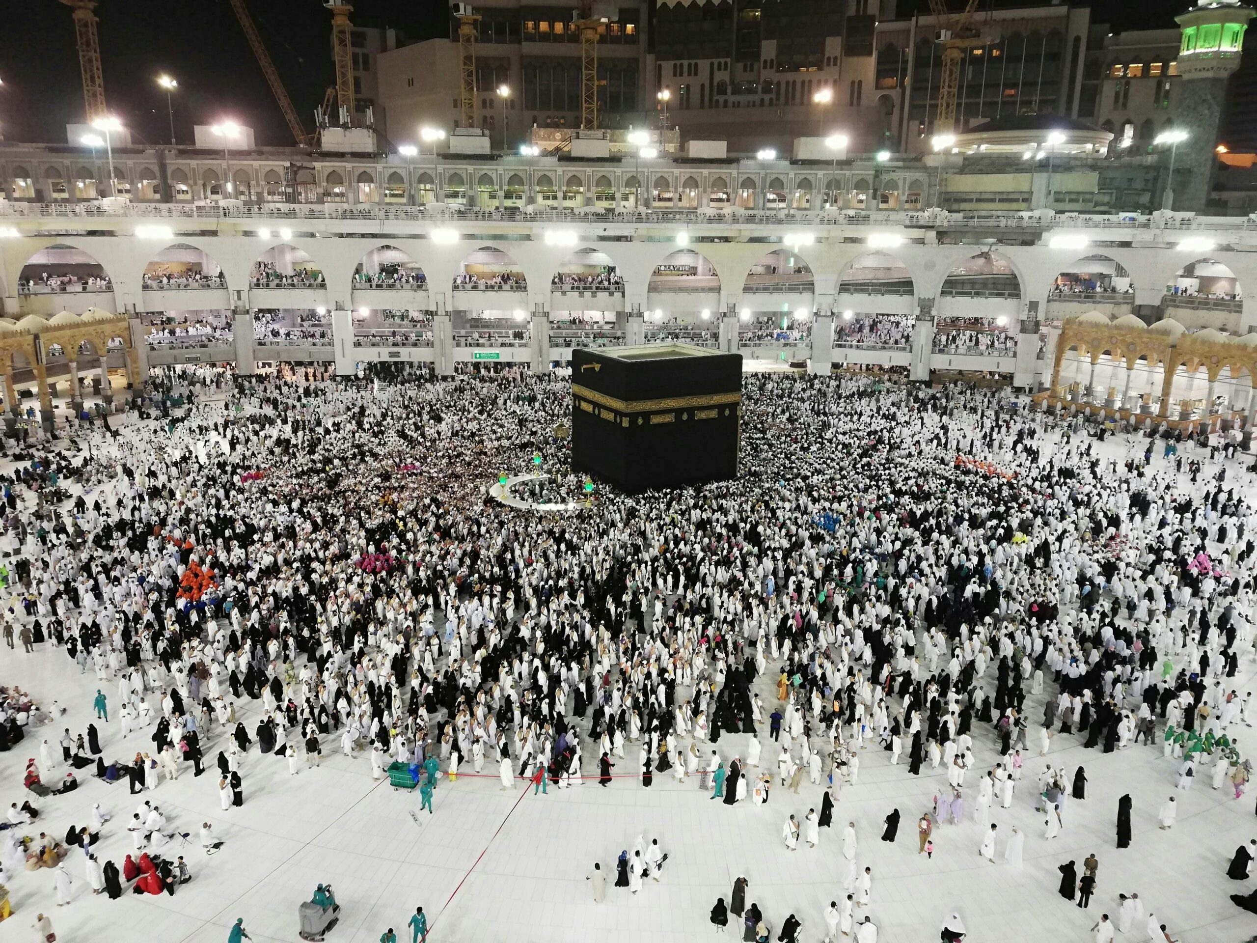 "Pilgrim preparing spiritually and mentally for Hajj journey."