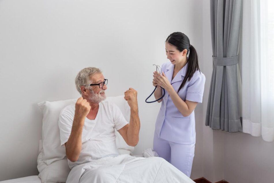 A nurse is cheering up a patient