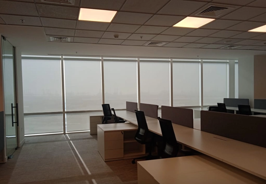 Modern office interior fitted with premium office blinds in Dubai for light control and privacy