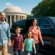 Top family-friendly limo tours in Washington, D.C., featuring a joyful family arriving at iconic landmarks.