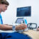 Man getting ultrasound of a abdomen from doctor