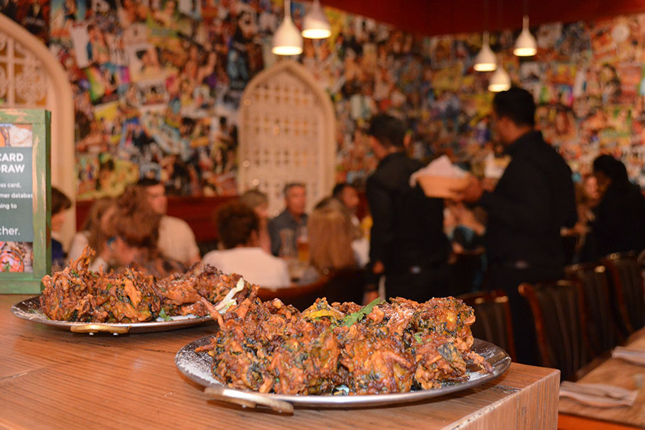 Delicious Indian appetizers served at India Authentic Restaurants in St Asaph Street with vibrant dining ambiance and happy guests.