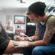 Tattoo artist creating detailed custom ink in tattoo studio Croydon