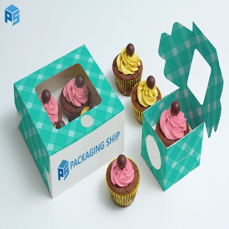 Turquoise custom cupcake boxes with clear windows displaying pink and yellow frosted cupcakes.