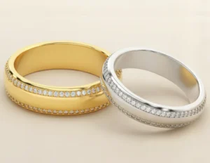 White gold ring and yellow gold ring placed side by side to compare their prices